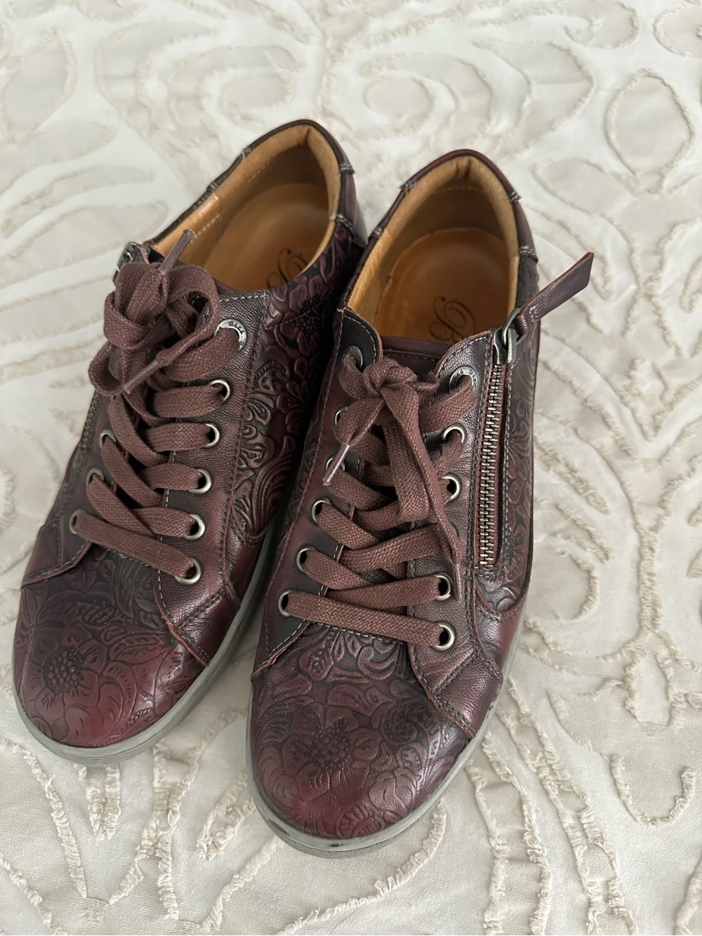 Women’s Embossed Leather Zip-Accent Sneakers in Reddish Brown